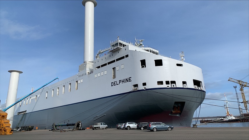 MV Delphine having her rotor sails fitted in the port of Rostock