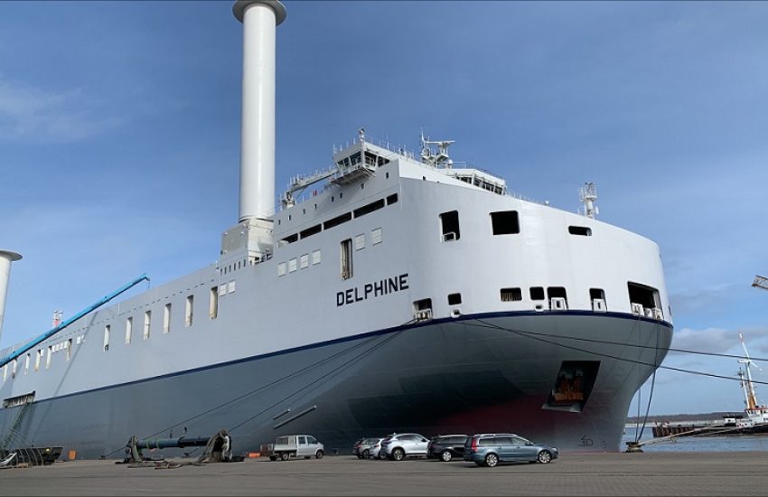 MV Delphine having her rotor sails fitted in the port of Rostock