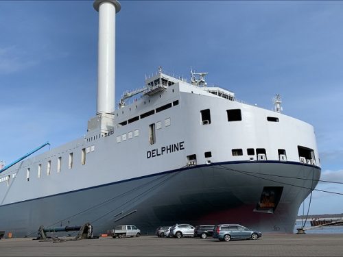 MV Delphine having her rotor sails fitted in the port of Rostock